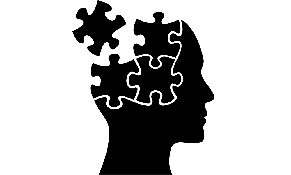 An icon of a head coming apart in puzzle pieces
