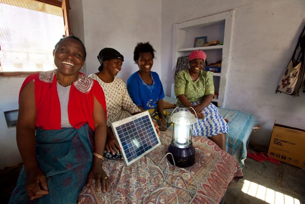 Solar engineers around a solar lantern