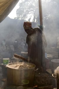 Haitian woman cooks