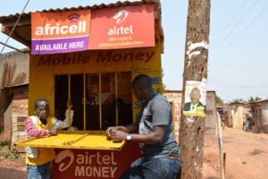 Mobile money transaction at agent's office in Uganda Picture credit: Fiona Graham / WorldRemit / Flickr (CC BY-SA 2.0)