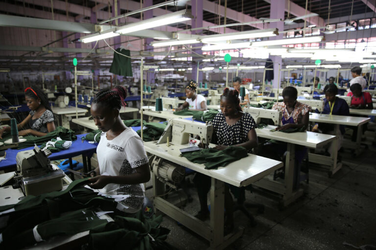 Factory workers in one of Ghana's businesses make shirts.