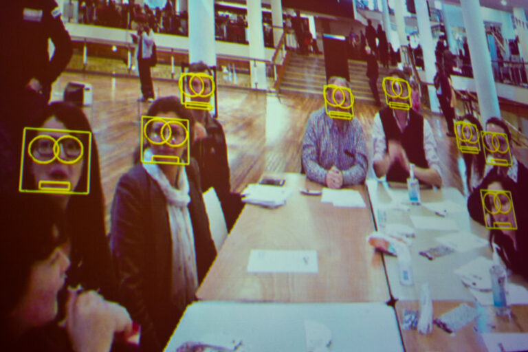 AI bias. Adam Harvey leads a demonstration on the functionality of facial recognition softwares and informs the audience of methods to help remain anonymous. This picture was taken during the second "Web We Want Festival." Photo: CC BY 2.0 Source: https://commons.wikimedia.org/wiki/File:Demonstration_of_facial_recognition_software.jpg