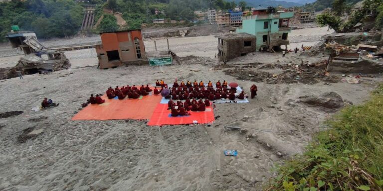 Buddhist monks conducting death rituals in Nepal’s Trishuli river valley in September 2026 to honour victims of devastating flash floods. Credit: Usha Titikshu, CC BY